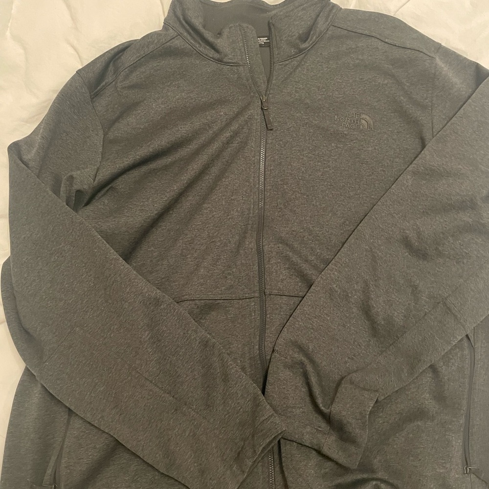 The North Face zip up jacket. Size XXL. Dark grey.